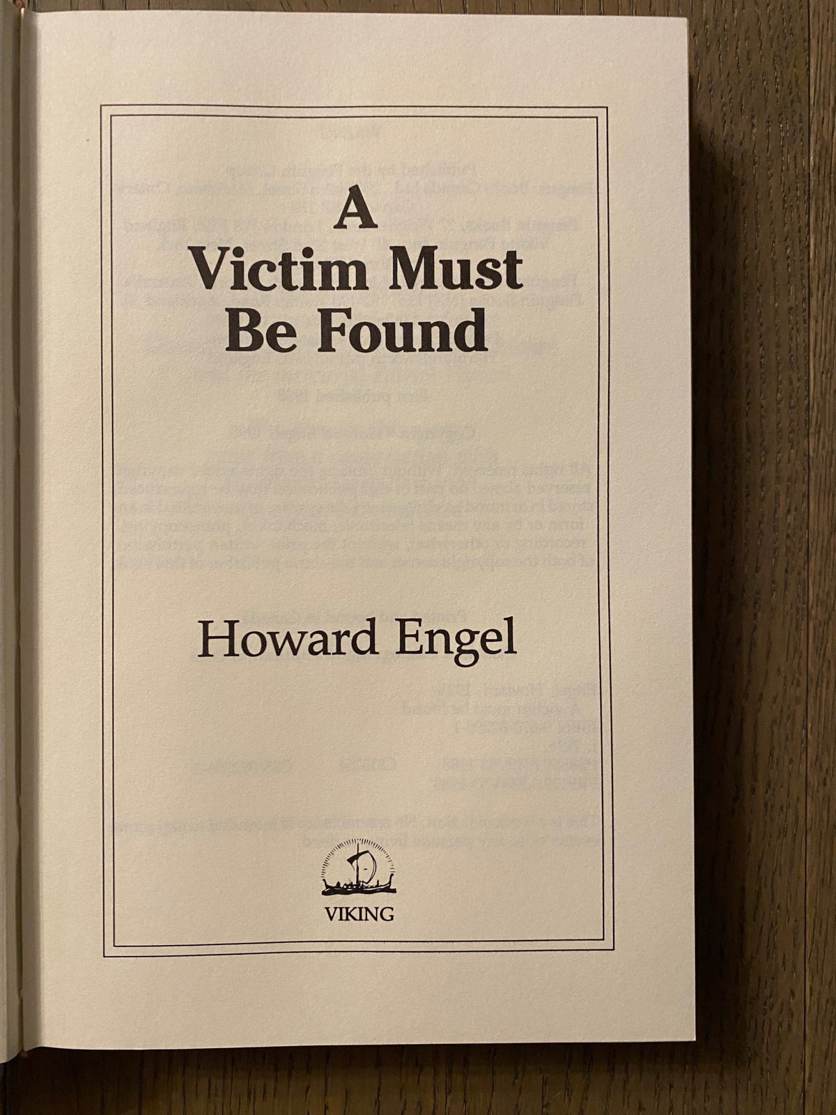1988 First Edition: A Victim Must Be Found, A Benny Cooperman Mystery, by Howard Engel