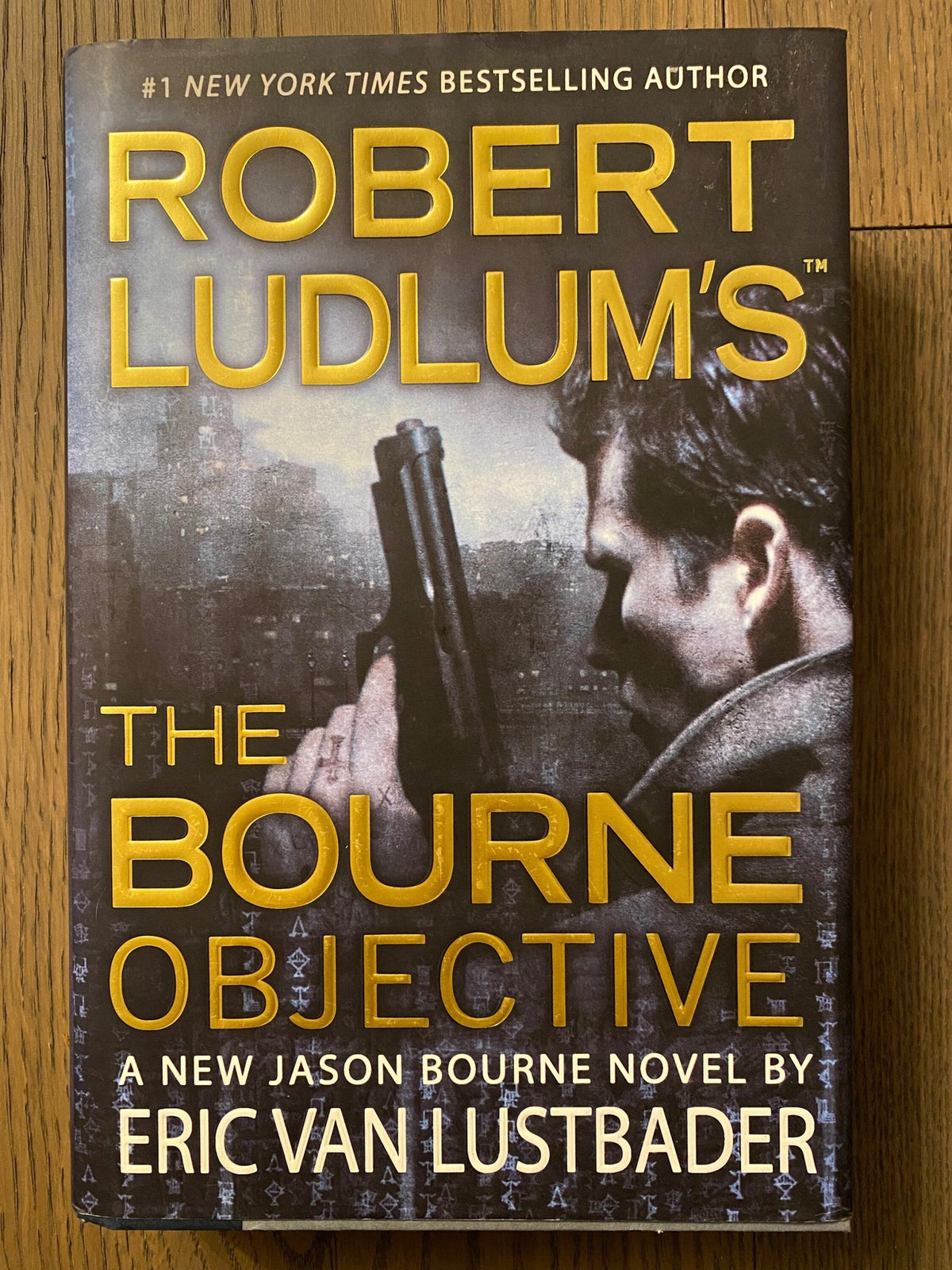Robert Ludlum's first editions The Bourne Objective, The Ambler Warning, The Bourne Supremacy