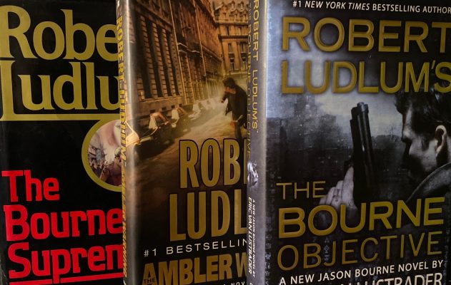 Robert Ludlum's first editions The Bourne Objective, The Ambler Warning, The Bourne Supremacy