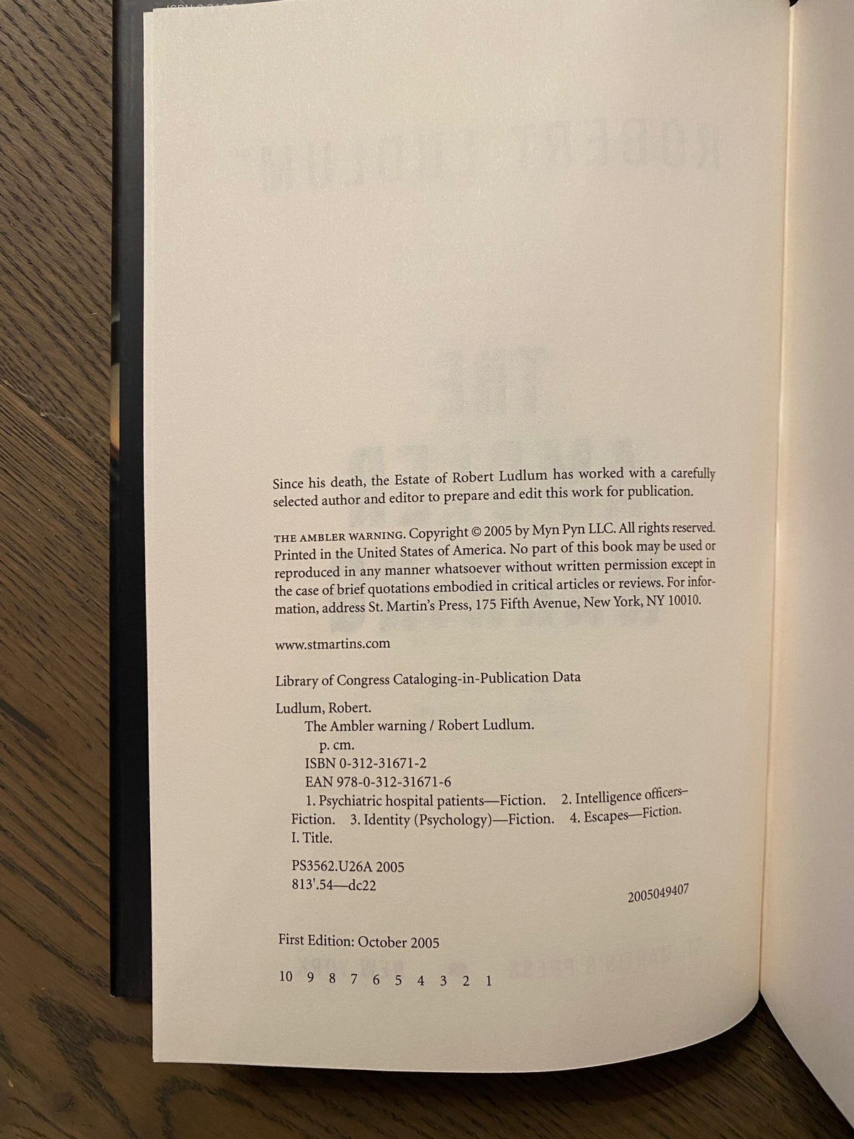 Robert Ludlum's first editions The Bourne Objective, The Ambler Warning, The Bourne Supremacy
