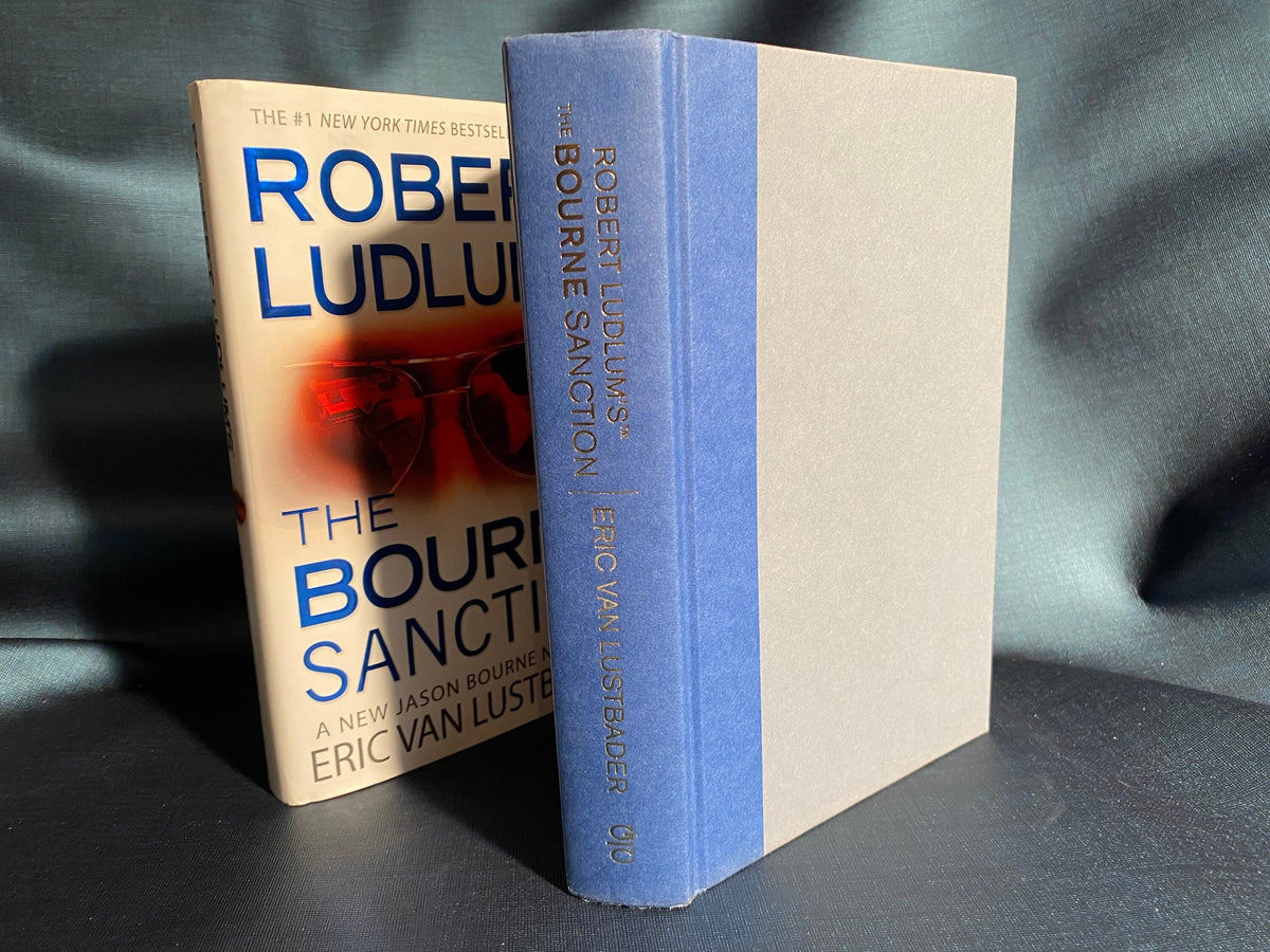2008 First Edition Robert Ludlum's (tm) The Bourne Sanction: a new Jason Bourne novel by Eric van Lustbader