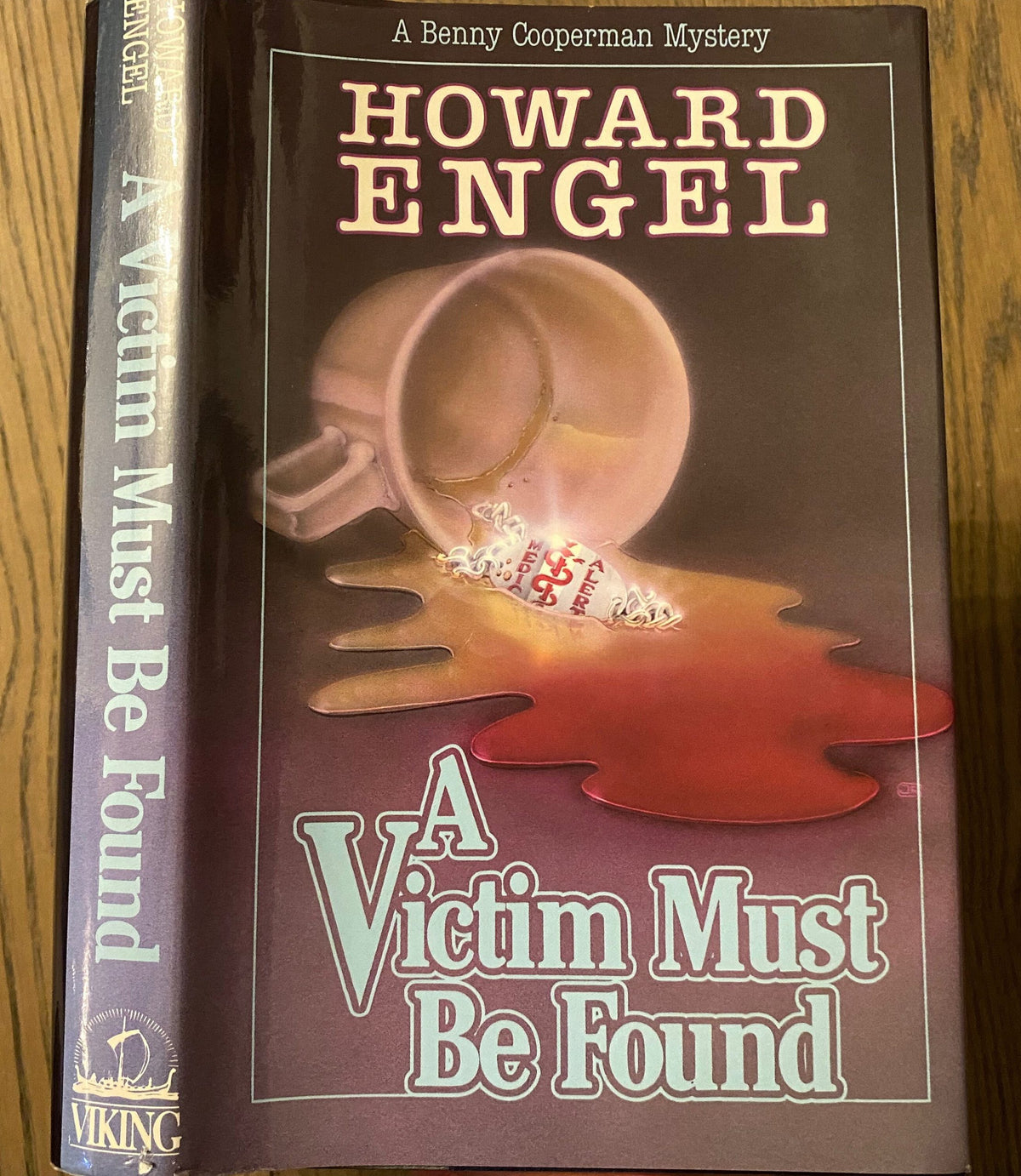 1988 First Edition: A Victim Must Be Found, A Benny Cooperman Mystery, by Howard Engel