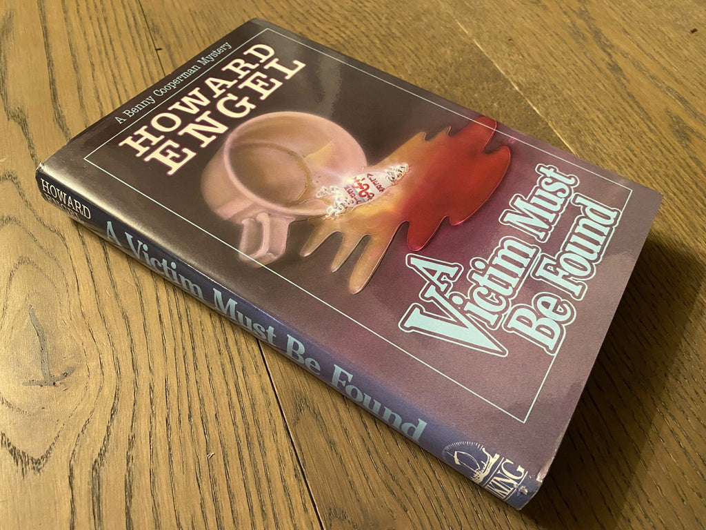 1988 First Edition: A Victim Must Be Found, A Benny Cooperman Mystery, by Howard Engel