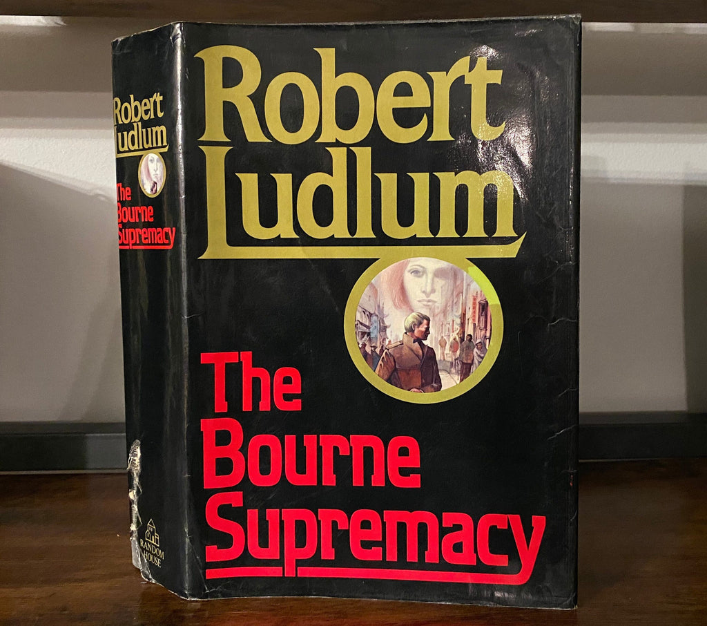 Robert Ludlum's first editions The Bourne Objective, The Ambler Warning, The Bourne Supremacy