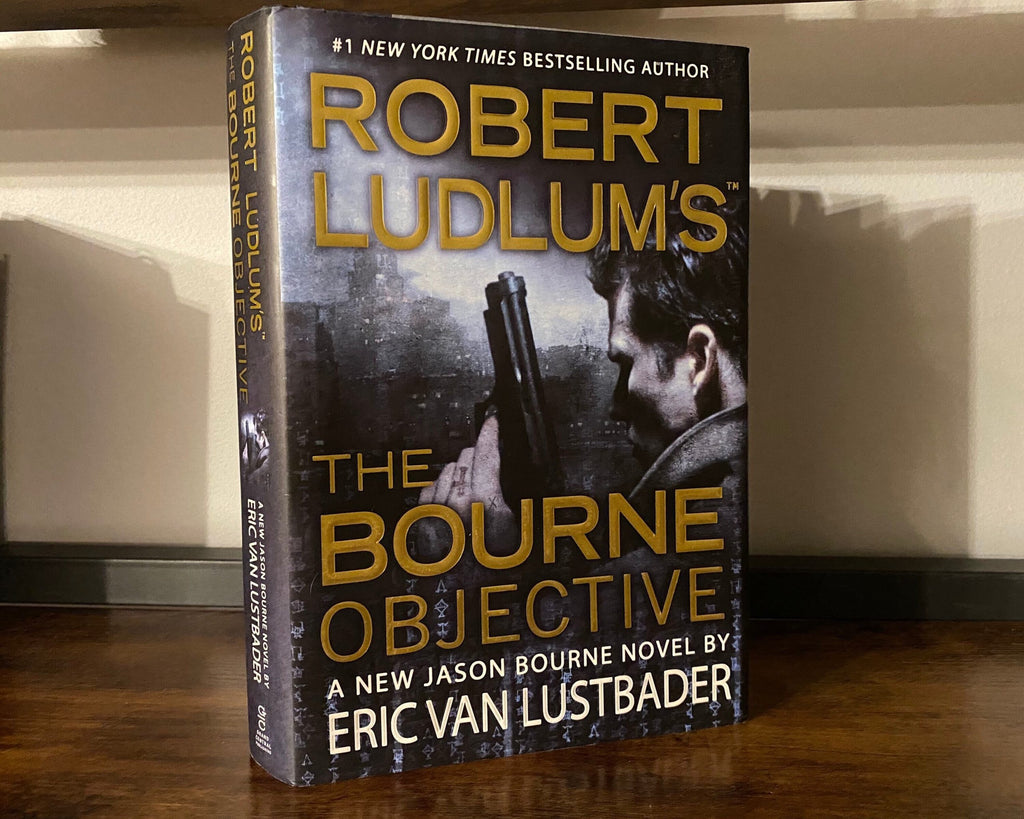 Robert Ludlum's first editions The Bourne Objective, The Ambler Warning, The Bourne Supremacy