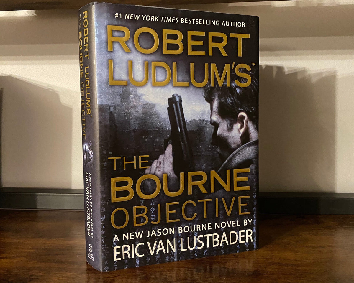 Robert Ludlum's first editions The Bourne Objective, The Ambler Warning, The Bourne Supremacy