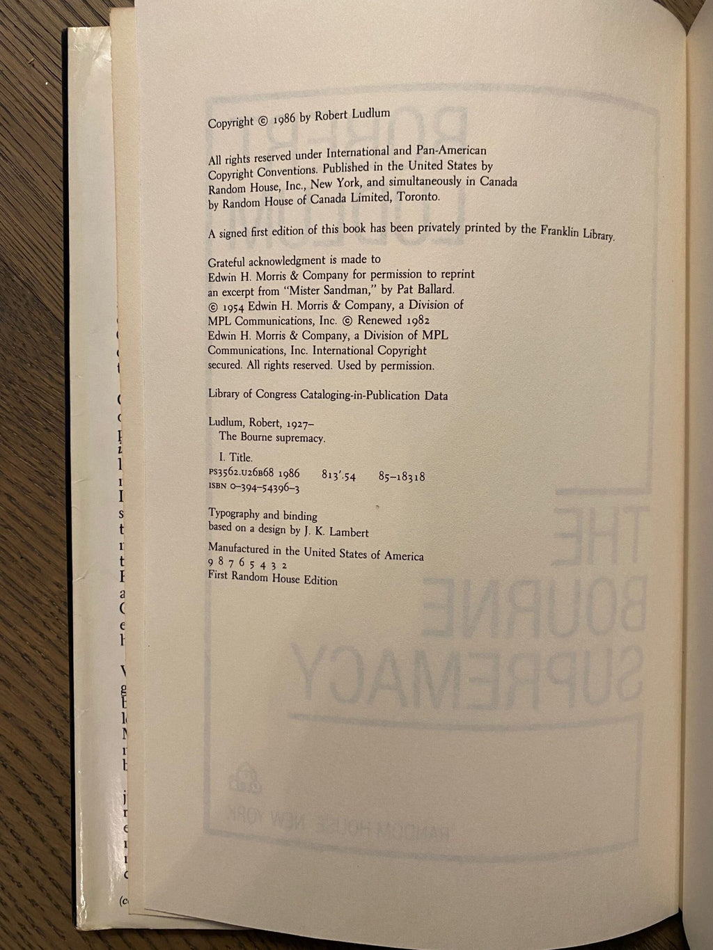 Robert Ludlum's first editions The Bourne Objective, The Ambler Warning, The Bourne Supremacy