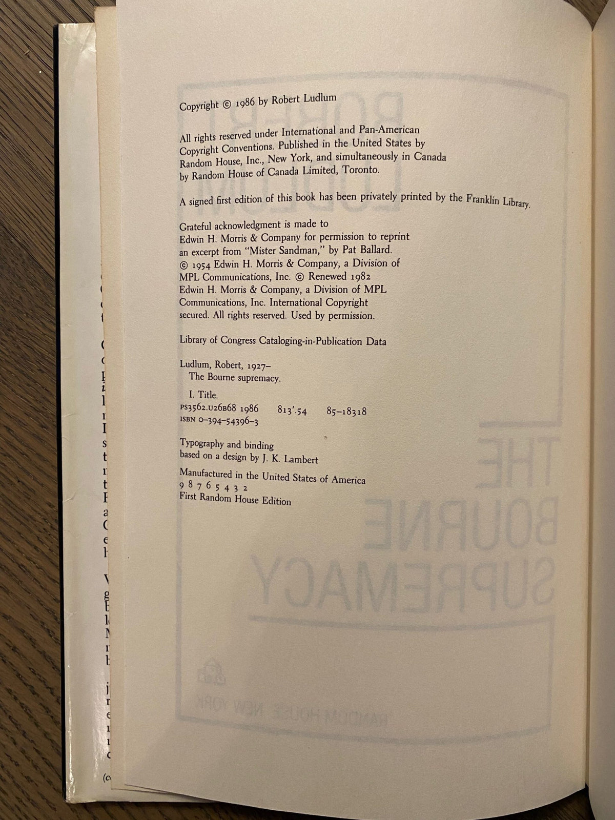 Robert Ludlum's first editions The Bourne Objective, The Ambler Warning, The Bourne Supremacy