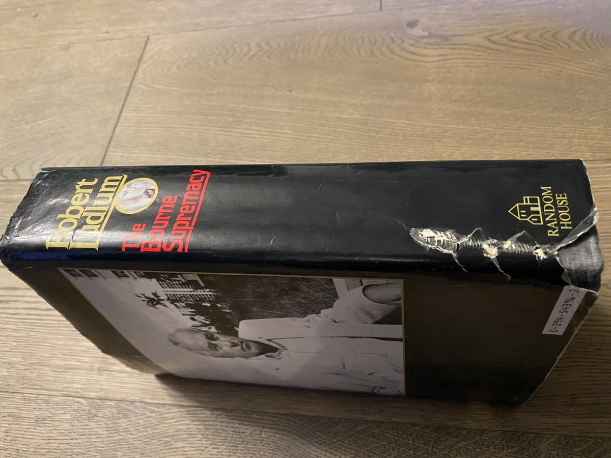Robert Ludlum's first editions The Bourne Objective, The Ambler Warning, The Bourne Supremacy